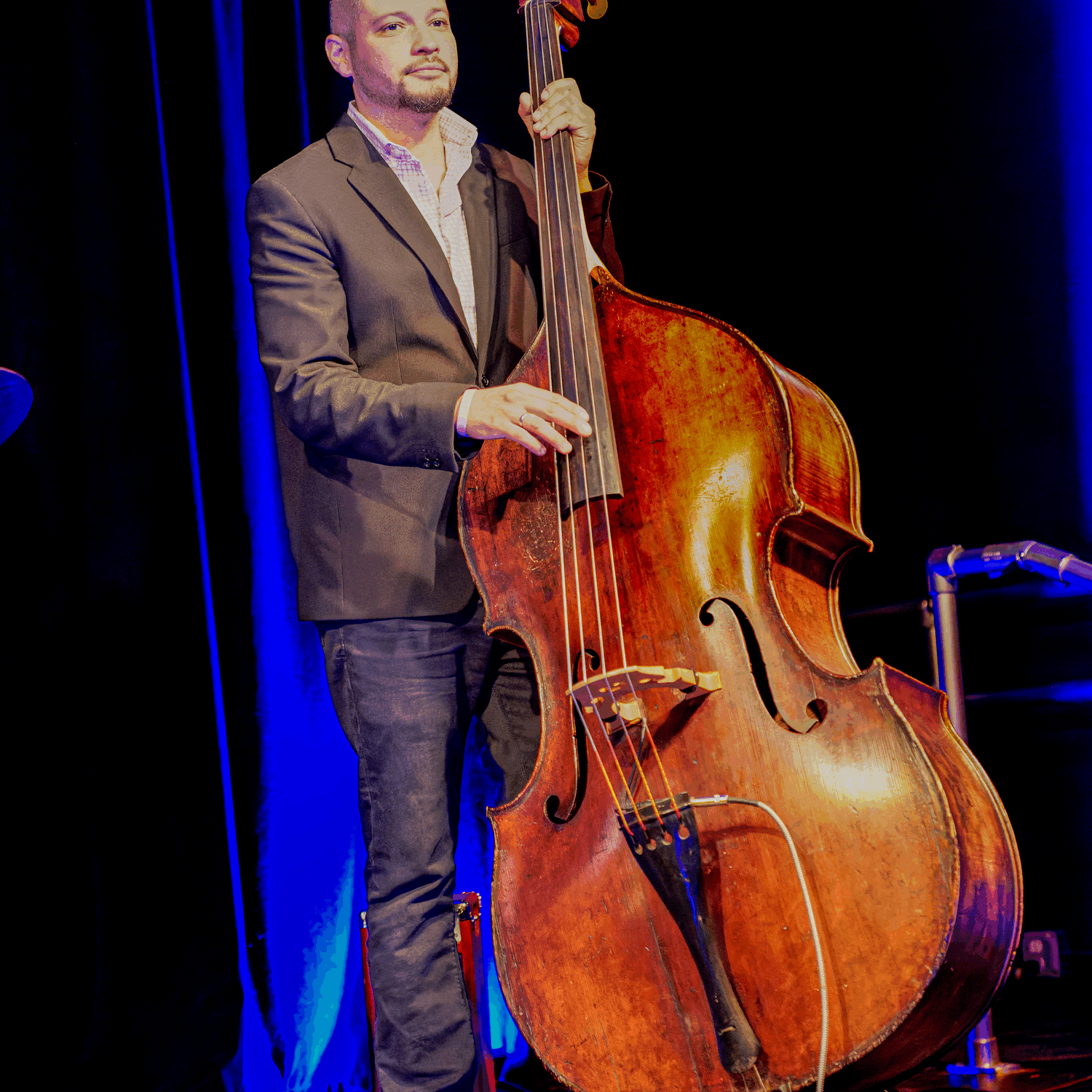 Playing Up right bass on stage